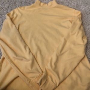 A yellow turtle neck